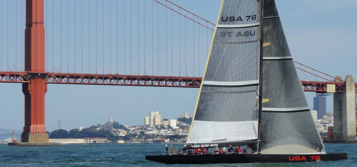 AC Sailing catamaran sailing under the Golden Gate Bridge