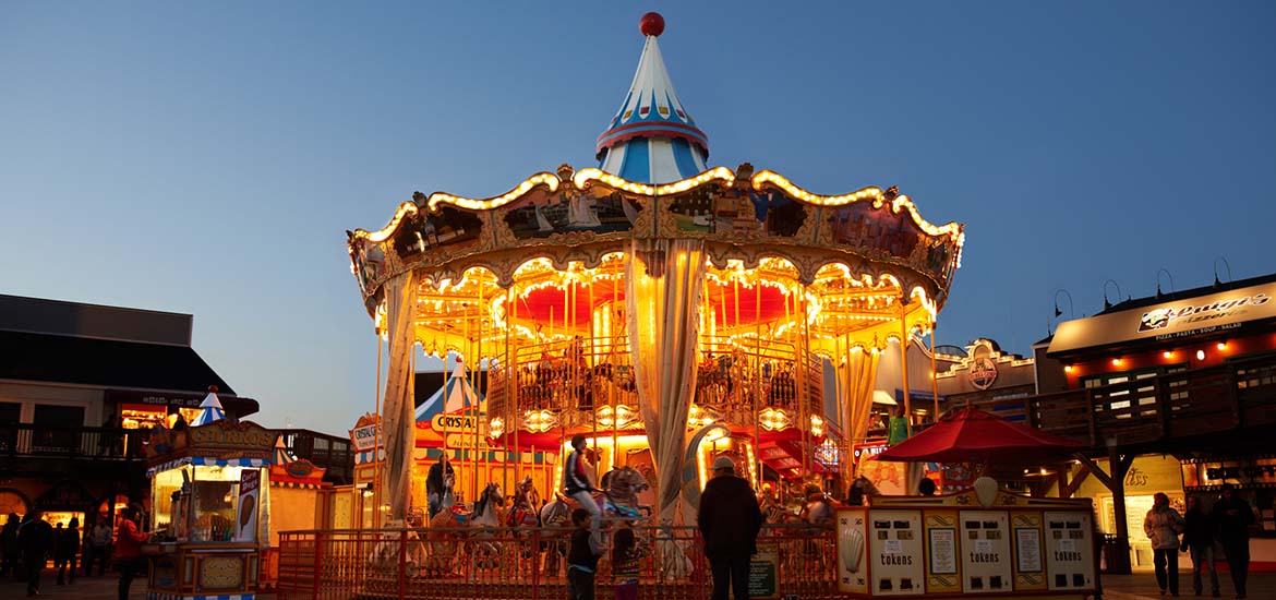 Carousel at night with thousands of twinkling lights