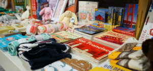 Colorful books, stuffed animals, clothes and other baby and children's gifts at Lola