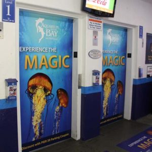 Elevator decals for advertising at PIER 39